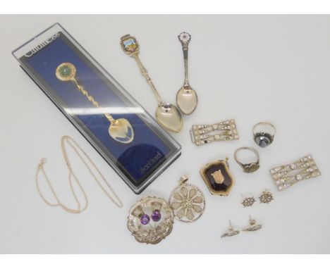 A collection of silver and costume jewellery a (af) carnelian and bloodstone locket, a Caithness spoon and other items Condit