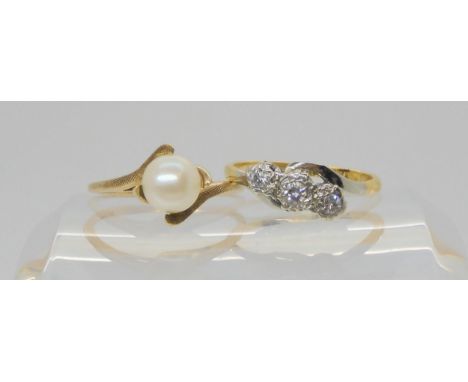 An 18ct gold classic three stone illusion set diamond ring, size L, weight 2.3gms, together with a yellow metal pearl set rin