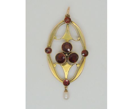 A yellow metal pearl &amp; garnet set Edwardian pendant, length 5cm, weight 4.3gms Condition Report:Available upon request