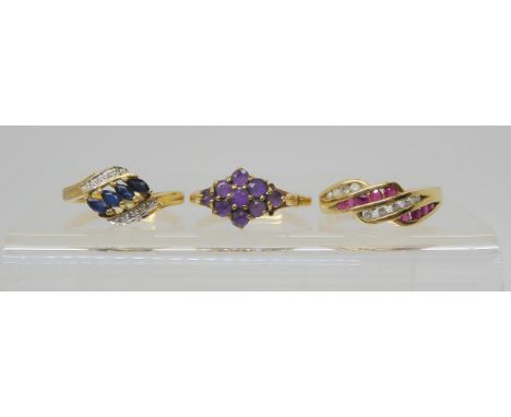 A 9ct ruby and cz set ring, size P1/2, and amethyst cluster, size Q, and a sapphire and diamond ring, size O1/2, weight toget