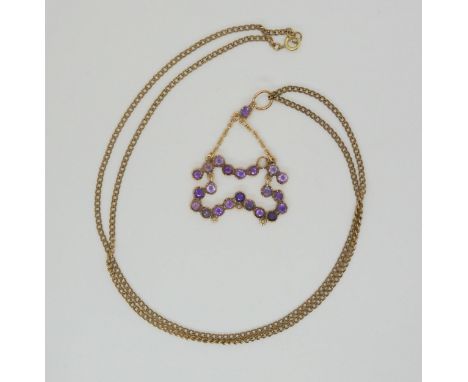 A yellow metal mounted amethyst pendant, weight 6.6gms with a gold plated chain Condition Report:Available upon request
