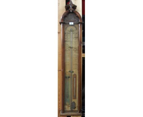 A Victorian oak Admiral Fitzroy barometer/thermometer, 115cm high Condition Report:Available upon request