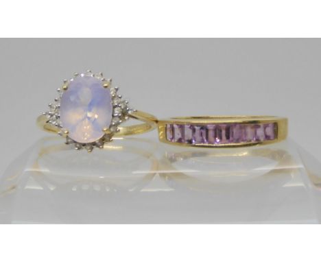 A 9ct gold purple sapphire band ring, size P1/2, together with a (ct yellow gold lavender quartz and white topaz ring size P1