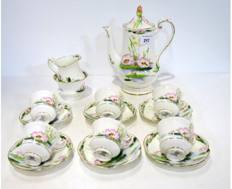 Royal Paragon Water Lily pattern coffee set, comprising coffee pot, six coffee cups and saucers, sugar bowl, and cream jug, a