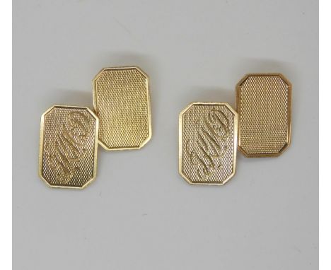 A pair of 9ct gold cufflinks, with monogram and engine turned engraved design. Weight 6.6gms Condition Report:Available upon 