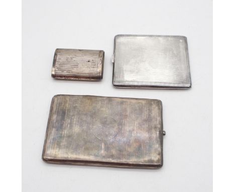 A George V silver cigarette case, the body with engine turned decoration, with a blank circular cartouche, by&nbsp;Colen Hewe