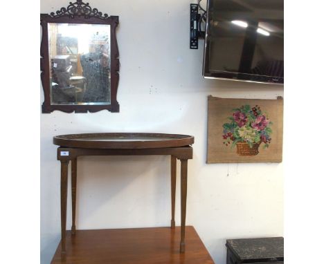 A Victorian mahogany framed bevelled glass wall mirror, another Victorian oak oval framed bevelled glass wall mirror, mahogan