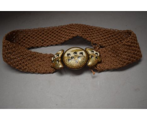 An interesting woven belt having Japanese ceramic Satsuma buckle with silver back.
good condition, some nominal fraying to fa