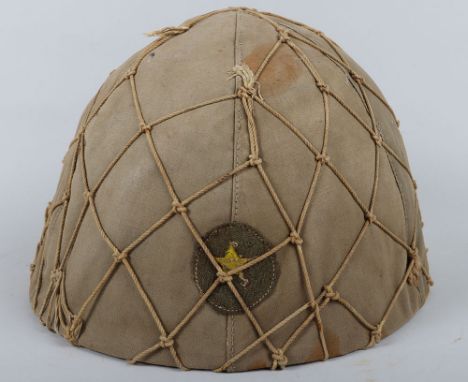WW2 Imperial Japanese Army Combat Helmet with Cover and Camouflaged Net, fine example of a standard type 90 combat helmet whi
