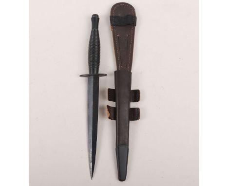 Post WW2 William Rodgers, Sheffield, Fairbairn Sykes (F.S) Commando Knife, with one piece ribbed blackened grip. Oval cross g