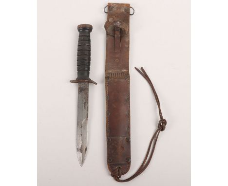 WW2 American M-3 Fighting Knife by Camillus, blade marked, housed in its original 1943 dated M-6 scabbard by Mills Co. Blade 