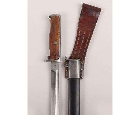 Norwegian M-1914 Krag Jorgensen Bayonet, with two piece wooden grips and steel mounts. Matching numbers and angled integral l