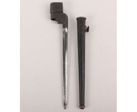 British No4 Mk1 Cruciform Spike Bayonet by Singer, example is a 1941 dated example. Housed in the original scabbard. 