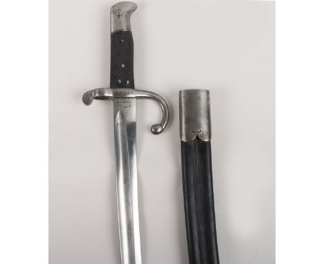 Danish Remington 1st Type M-1867 Bayonet, example with leaf spring locking, two piece chequered grips. Steel cross guard with