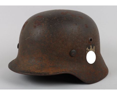 WW2 German Army M-40 Single Decal Steel Combat Helmet, good untouched as found example of a M-40 single decal steel helmet wh