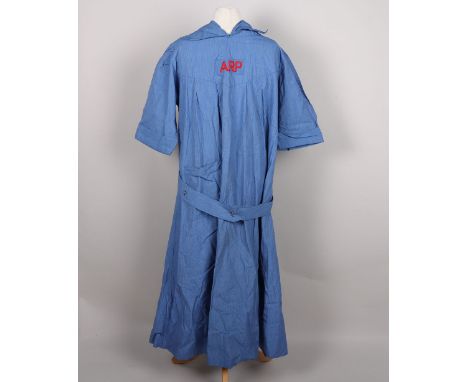 WW2 British Female ARP Dress, blue cloth pin stripe dress with embroidered ARP rectangular insignia to the centre. Open back 