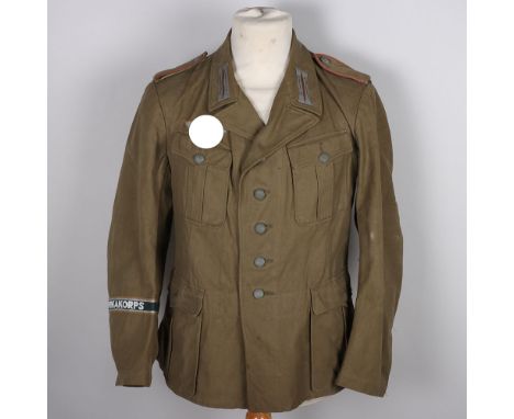 WW2 German Army Tropical Afrikakorps 1st Pattern Combat Tunic, olive tropical canvas constructed jacket with original applied