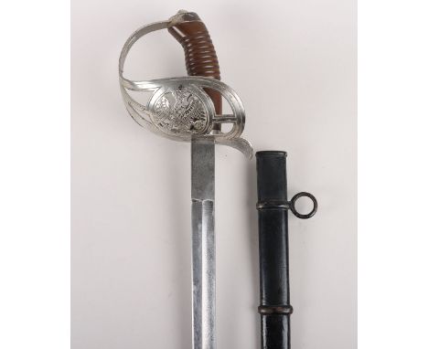 Imperial German Model 1889 Cavalry Sword, basket hilt sword with Prussian eagle to the central cartouche, plain knuckle bow a