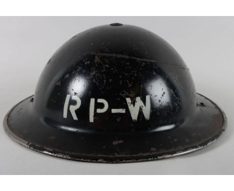 WW2 British Home Front Repair Party Water Steel Helmet, standard WW2 pattern British helmet painted black and with white sten