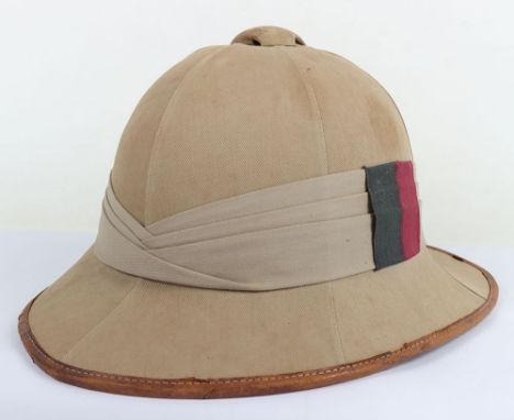 1930’s British Officers Foreign Service Woolsley Helmet, fine khaki cloth covered cork foreign service helmet with cloth six 