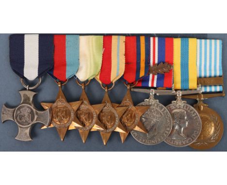 Second World War Arctic Convoys Distinguished Service Cross Medal Group of Eight to Commander P.G Satow Who Survived the Loss