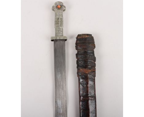 Tibetan or Bhutanese Sword, 19th Century, broad straight single edge blade 72.5cms forged with ‘needle’ pattern, hatchet tip,