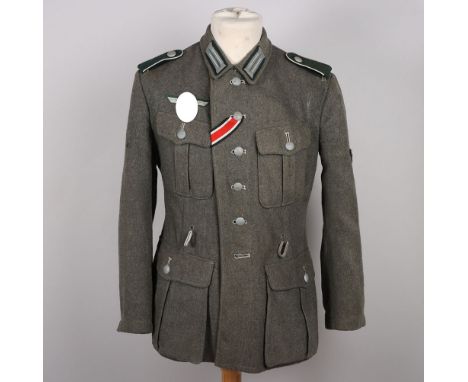 WW2 German Army (Heer) M-42 Combat Tunic, wool constructed tunic with matching authentic infantry enlisted shoulder boards. B