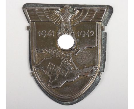 WW2 German Army / Waffen-SS Krim Campaign Shield, bronzed steel construction with integral side prongs and steel backplate. O