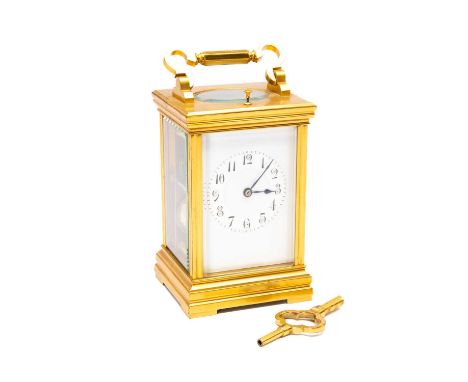 GILT BRASS FIVE GLASS CARRIAGE CLOCK, white enamel dial with Arabic numerals, push repeat button, with winding key,15cms high