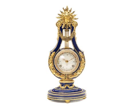 REPRODUCTION FRENCH STYLE PORCELAIN MANTEL CLOCK, after the original belonging to Marie Antoinette, 38cms hProvenance: privat