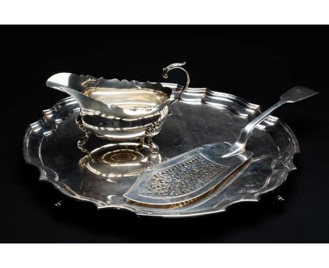 GEORGE III SILVER FISH SLICE, Williams Pits, London 1795, together with a George VI silver sauce boat, 1937, and an Elizabeth
