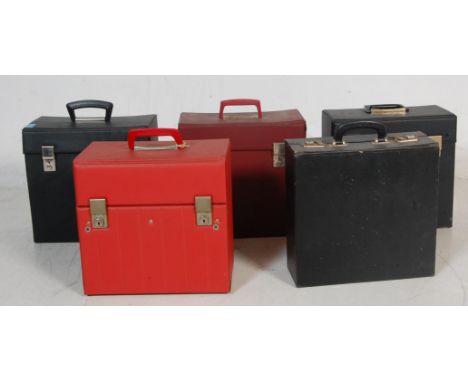 A collection of six vintage 20th century 12” record carry cases having single handle to the top and twin chrome lockers to th