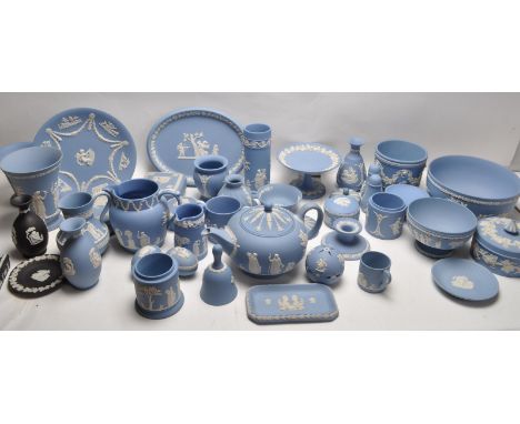 A large and impressive collection of 19th century and 20th century Wedgwood Jasperware ceramic wares to include plates , vase