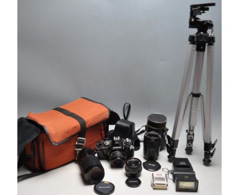 A collection of vintage camera equipment to include a A Chinon CE-4 automatic 35mm SLR camera, Pentax 28mm lens, Tefnon 28-80