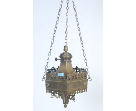 An early 20th century Moroccan / Islamic style brass ceiling hanging oil lamp having a pierced decoration with long chains be