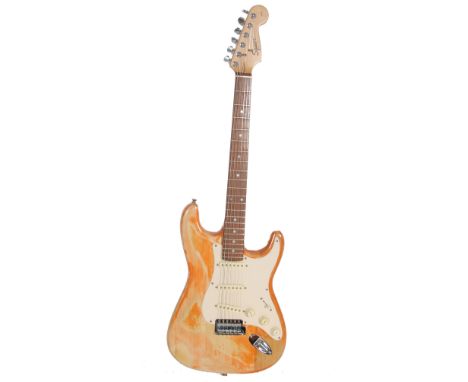 A vintage Squier Strat by Fender Affinity Series Stratocaster electric guitar instrument having a C-shaped neck profile, sing