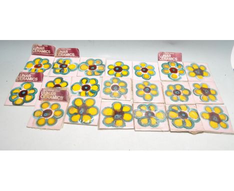 A large collection of retro mid century 1970s Lunar Ceramic tiles designed by Jean Powell. All are hand painted and glazed wi