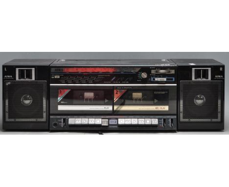 A retro vintage 1980s Aiwa CA-W30 stereo boombox twin tape deck music system. The boombox having a 2 way speaker system with 