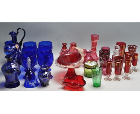 A large collection of 19th century and later ruby flash glass and blue glass items to include Bohemian overlay glass, Mary Gr