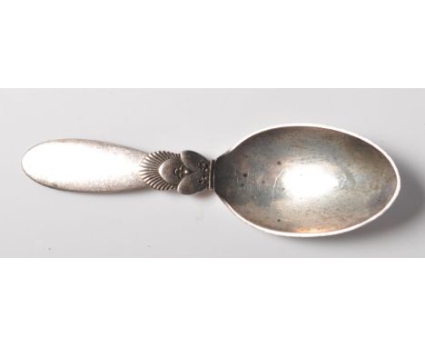 A Georg Jensen Danish 1960's silver caddy spoon in the cactus pattern with an oval bowl and handle. Import marks for 1961, ma
