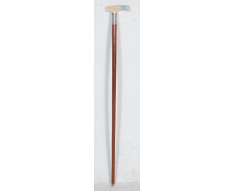 A 19th century Victorian bone handled walking stick having an engine turned hallmarked sterling silver collar with malacca. B