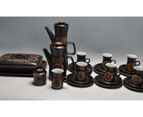 A vintage retro 1970's Denby Arabesque pattern coffee service having a brown glaze with concentric circle decoration, consist