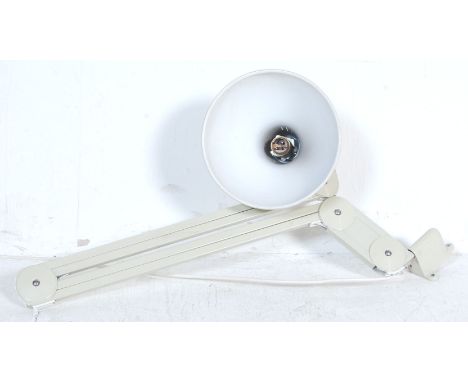 A 20th century Herbert Terry style Industrial / medical wall mounted anglepoise lamp. The three sectional arm with wall mount