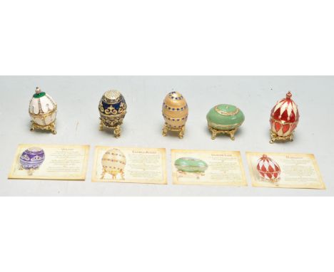 A collection of five 20th century enamel decorative eggs in the manner of Faberge &nbsp;by Atlas Edition to include: Vanilla 