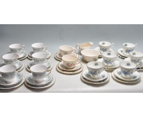 A collection of three 20th century bone china tea set / service to include a six trio by Queen Anne Green Leaf pattern tea se