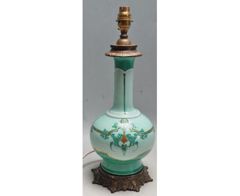 A 19th century Victorian antique Opaline glass / ceramic lamp / table lamp base of a baluster form with gilded detailing rais