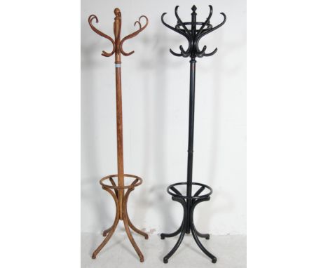 A vintage 20th century mahogany Thonet style bentwood hat stand being raised on splayed legs with s-shaped hooks atop. Togeth