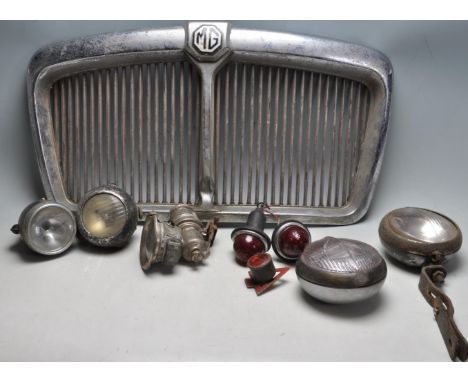 Of automobile interest - A vintage mid 20th century MG Magnetic MK III front grill together with a collection of vintage car 