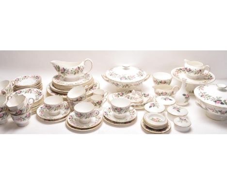 A large 20th century Wedgewood tea and dinner service in the Hathaway Rose pattern, comprising of dinner plates, tureens, cof