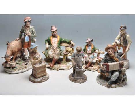 A collection of seven vintage 20th century ceramic figurine to include Italian Capodimonte figurines and Bisque style Portugu